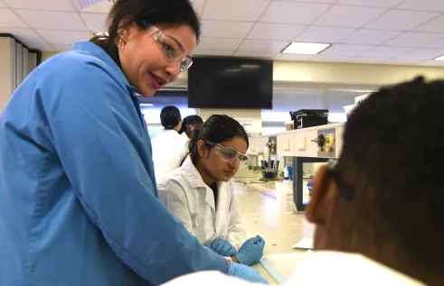 Senior Lecturer in Medical Laboratory Science Sherouk Fouda supervising some Year 11 and 12 students from various Darwin high schools who attended the 2025 CDU Health